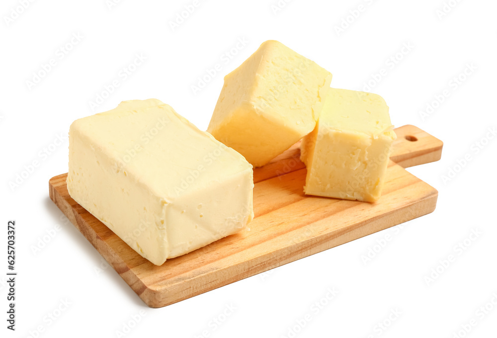 Wooden board with fresh butter on white background
