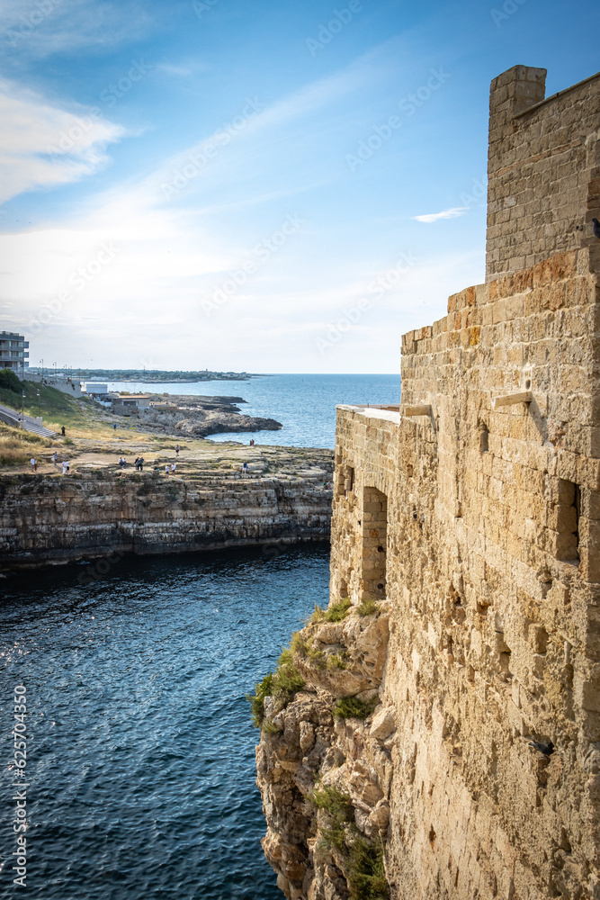 cliffs of polignano a mare, caves, grottos, bari, puglia, italy, europe