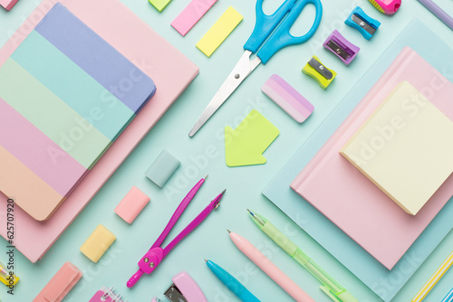 Flat lay with colorful school stationery on color backgroung, top view