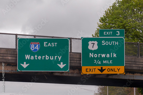 Exit 3 sign for US7 South toward Norwalk, Connecticut on Interstate 84 Yankee Expressway east toward Waterbury, Connecticut photo