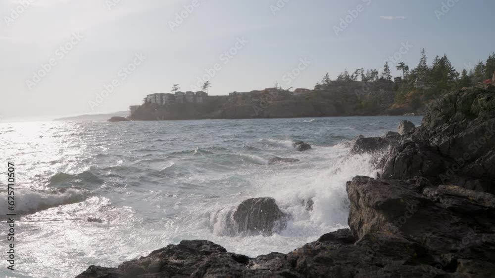 Beautiful ocean vista with waves crashing on the rocks, ocean spray, Vancouver Island, Pacific ocean 4K 24FPS