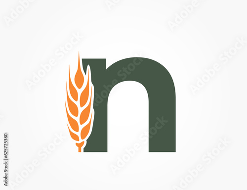 lowercase letter n with wheat ear. harvest alphabet logo. cereal farming and agriculture design. isolated vector image
