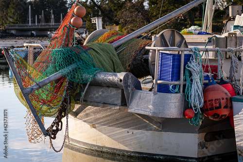 Colourful commercial shrimping equipment on stern of fish boat