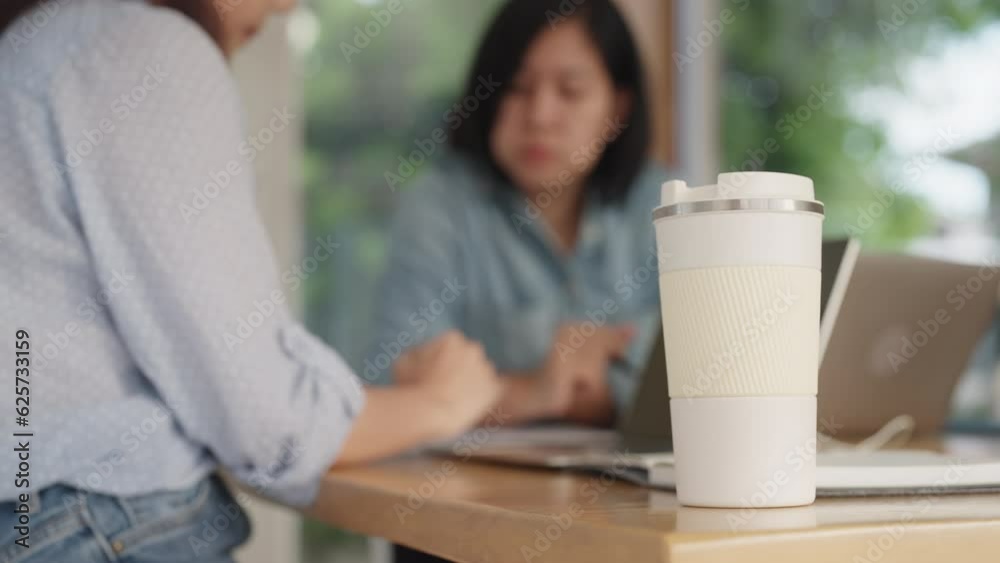Gen Z asia people reduce single use plastic by using reuse insulated hot drink coffee cup eco friendly go green bottle in urban city life. Net zero business ecology care waste free ecofriendly office. Gen Z asia people reduce single use plastic by using reuse insulated hot drink coffee cup eco friendly go green bottle in urban city life. Net zero business ecology care waste free ecofriendly office.