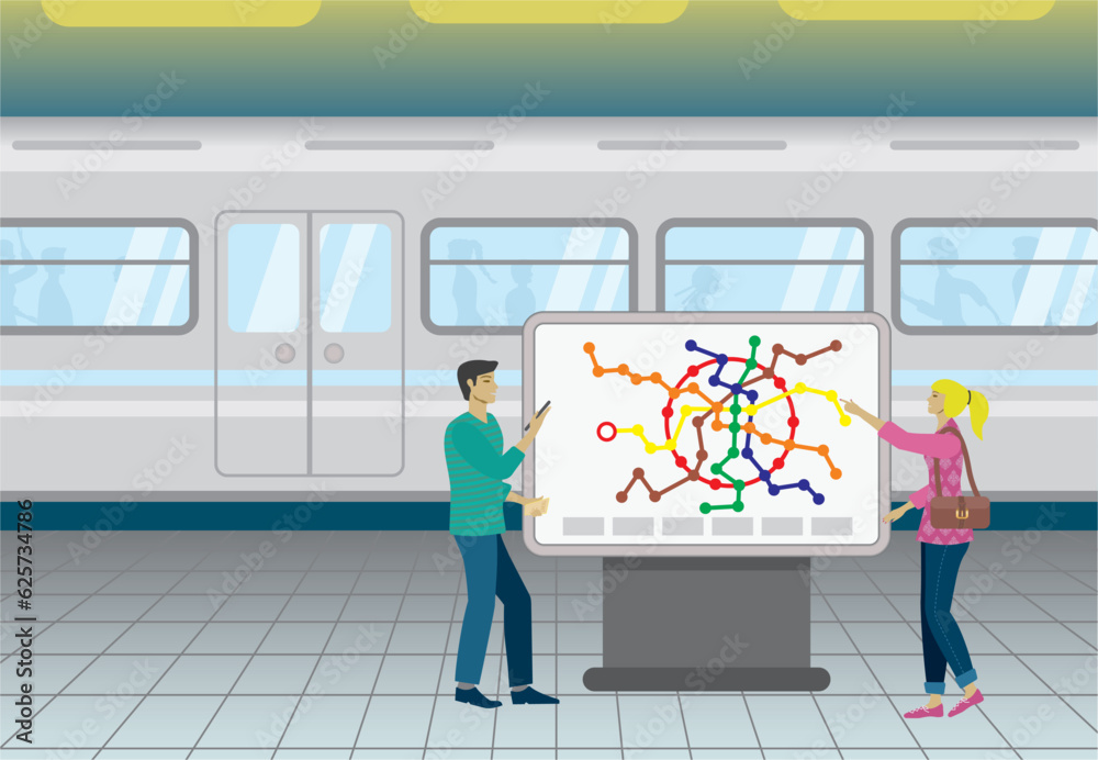 Man and woman at subway train station, standing at information map sign ...