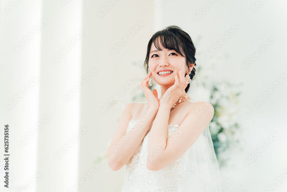 ブライダルエステ・花嫁美容のイメージ・頬を触る新婦・花嫁(ウェディング)
ブライダルエステ・花嫁美容のイメージ・頬を触る新婦・花嫁(ウェディング)