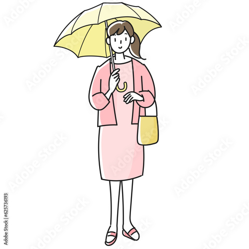 傘をさす若い女性