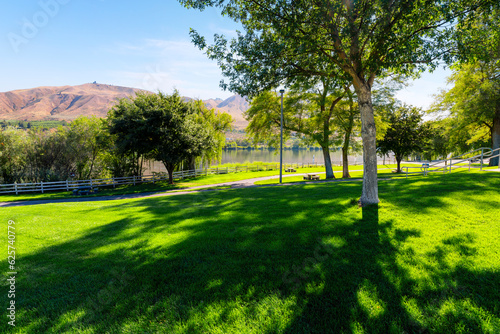 The scenic waterfront Kirby Billingsley Hydro Park along the Columbia River as it runs through East Wenatchee on Highway 28 in Chelan County, Washington State, USA. photo