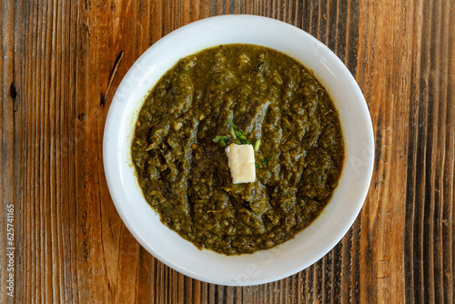 Indian saag made with spinach, mustard greens and spices photo