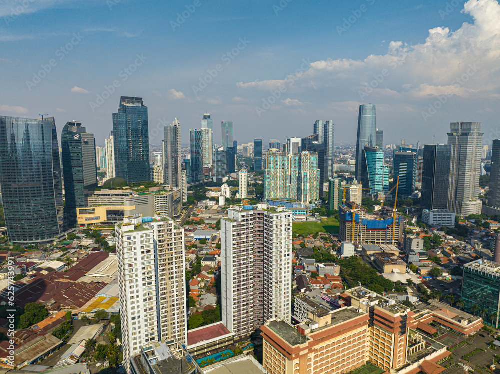 Naklejka premium Jakarta business district view from above in Indonesia capital city with many modern skyscrapers. Indonesia.