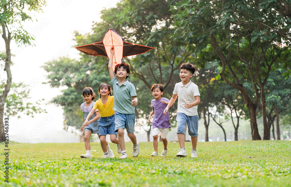 Obraz premium group image of cute asian children playing in the park