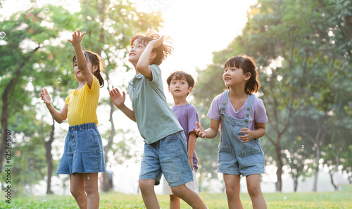 group image of cute asian children playing in the park