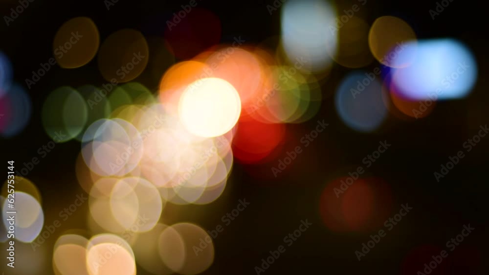 Dreamy specks of light flowing at night in the city Dreamy specks of light flowing at night in the city