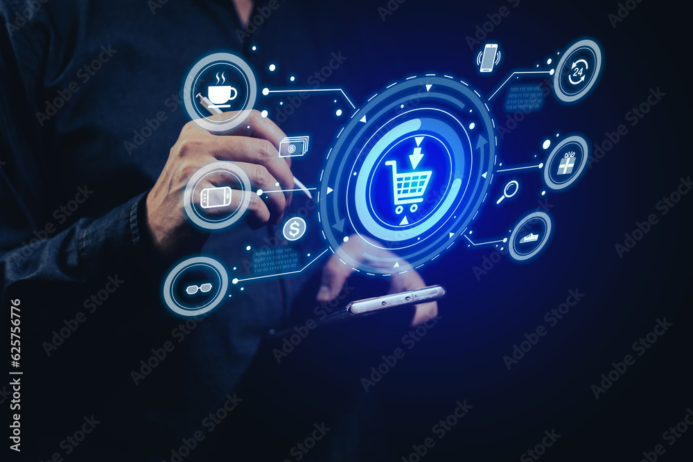 Fototapeta premium Male shopper touching pen to smartphone for online shopping with various products, e-commerce technology concept
