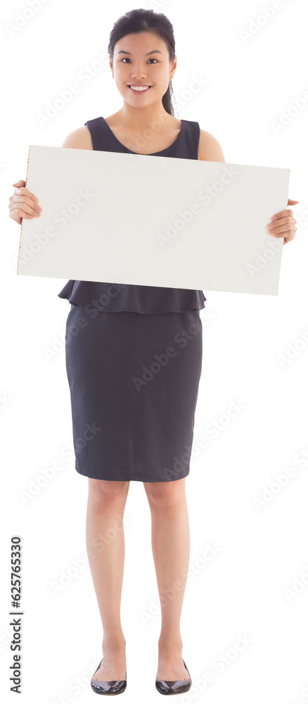 Digital png photo of happy asian businesswoman holding blank sign on transparent background Digital png photo of happy asian businesswoman holding blank sign on transparent background