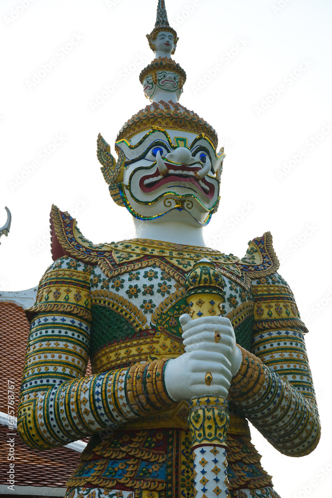 white giant statue at Arun temple in landmark of Thailand