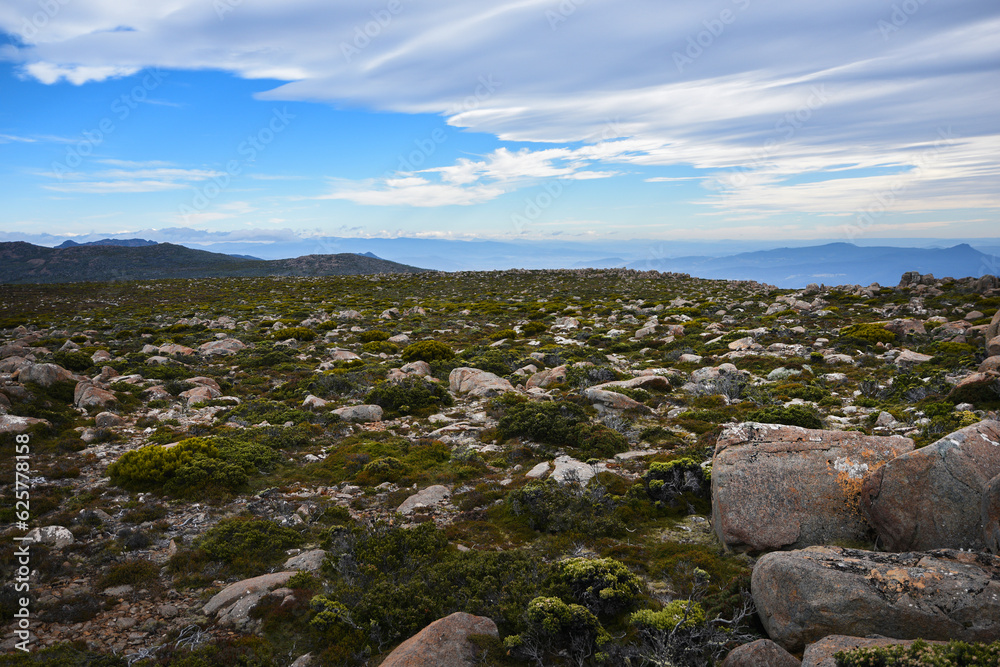 beautiful landscape vista of Mount Wellington tourist landmark in Hobart Tasmania in Australia, with granite stones and scrubland nature beautiful landscape vista of Mount Wellington tourist landmark in Hobart Tasmania in Australia, with granite stones and scrubland nature