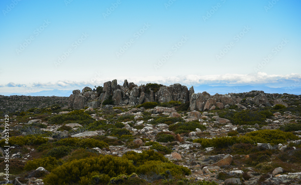 beautiful landscape vista of Mount Wellington tourist landmark in Hobart Tasmania in Australia, with granite stones and scrubland nature beautiful landscape vista of Mount Wellington tourist landmark in Hobart Tasmania in Australia, with granite stones and scrubland nature