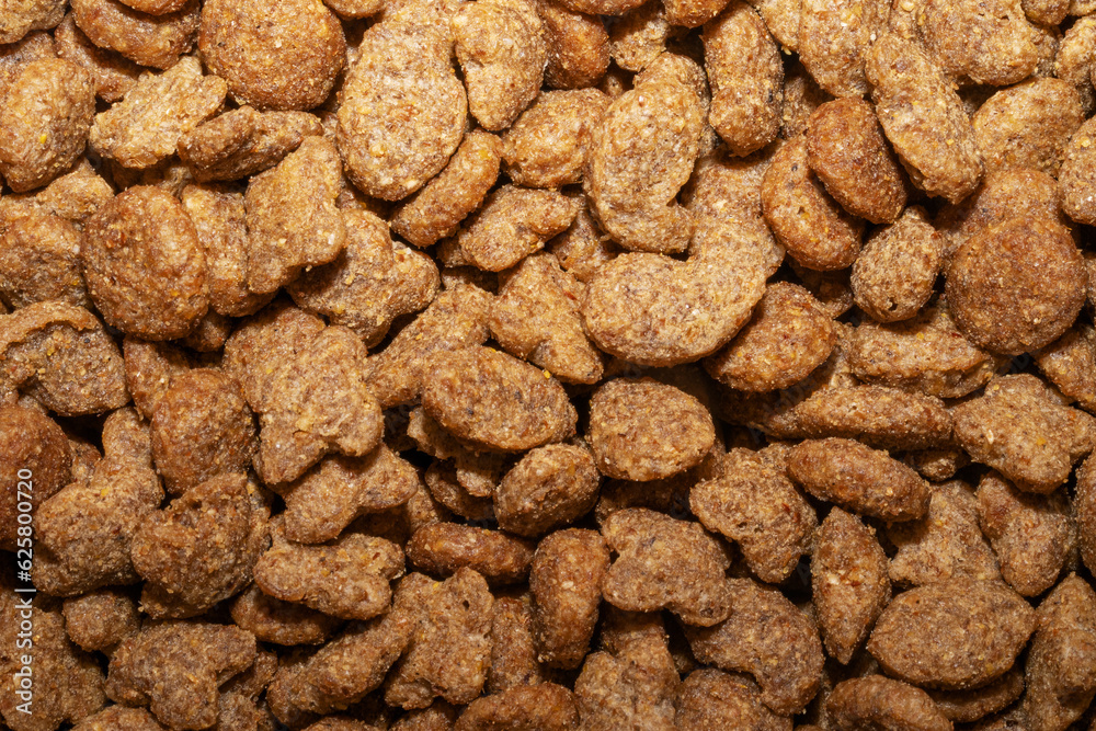 Cat food as background. Healthy dry pet food. Top view.