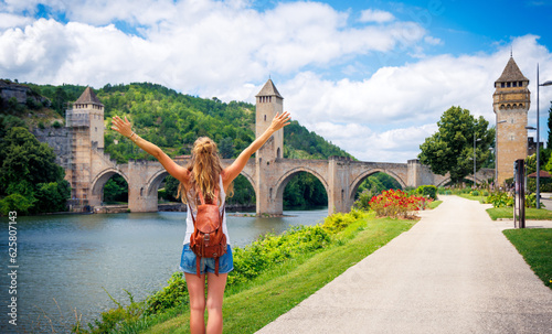 Woman with open arms in Cahors- Lot in France