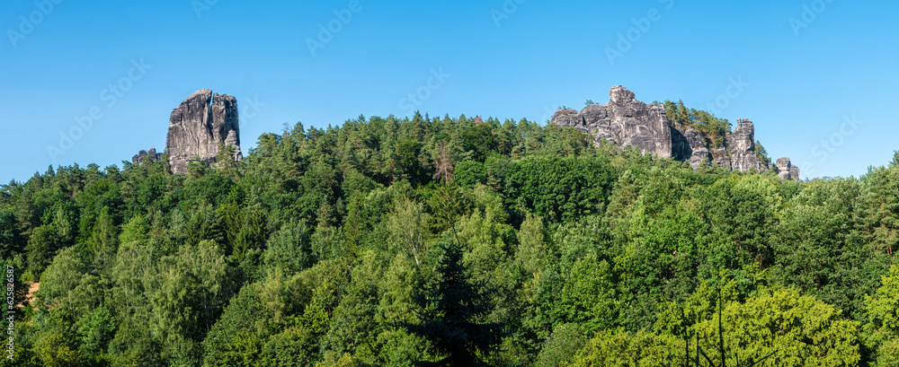 Panoramic view over Bastei sandstone rocks and dense forest in the national park Saxon Switzerland, Kurort Rathen, Germany.