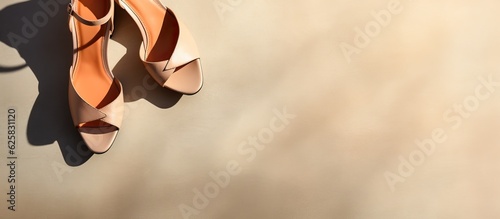 Photo of a pair of shoes hanging on a wall with plenty of copy space with copy space photo
