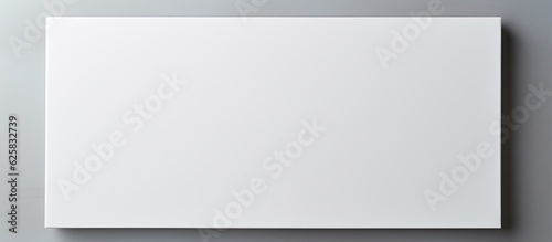 Photo of a blank white paper hanging on a wall with plenty of copy space with copy space