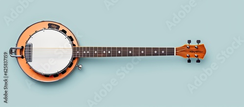 Photo of a close up of a small orange and white musical instrument with copy space with copy space photo