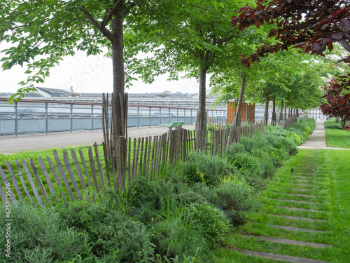 Fototapeta Naklejka Na Ścianę i Meble -  Paris, France - May 12th 2023: Beautiful green promenade above Gare de l'est