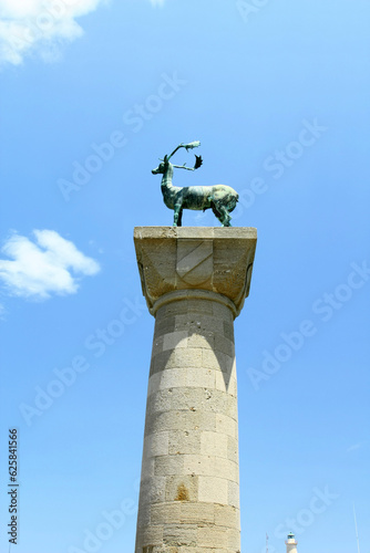 A statue of a deer in the harbor on the Greek island of Rhodes.