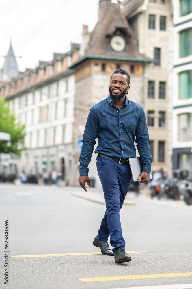 Handsome bearded dark-skinned man in the city center Handsome bearded dark-skinned man in the city center