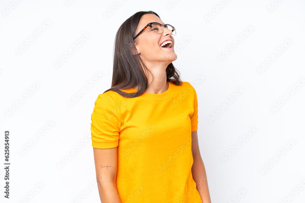 Young caucasian woman isolated on white background laughing in lateral position Young caucasian woman isolated on white background laughing in lateral position