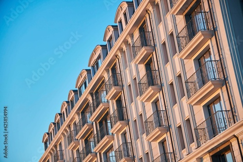 The facade of a modern building in the sunset light