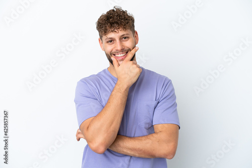 Young handsome caucasian man isolated on white background happy and smiling