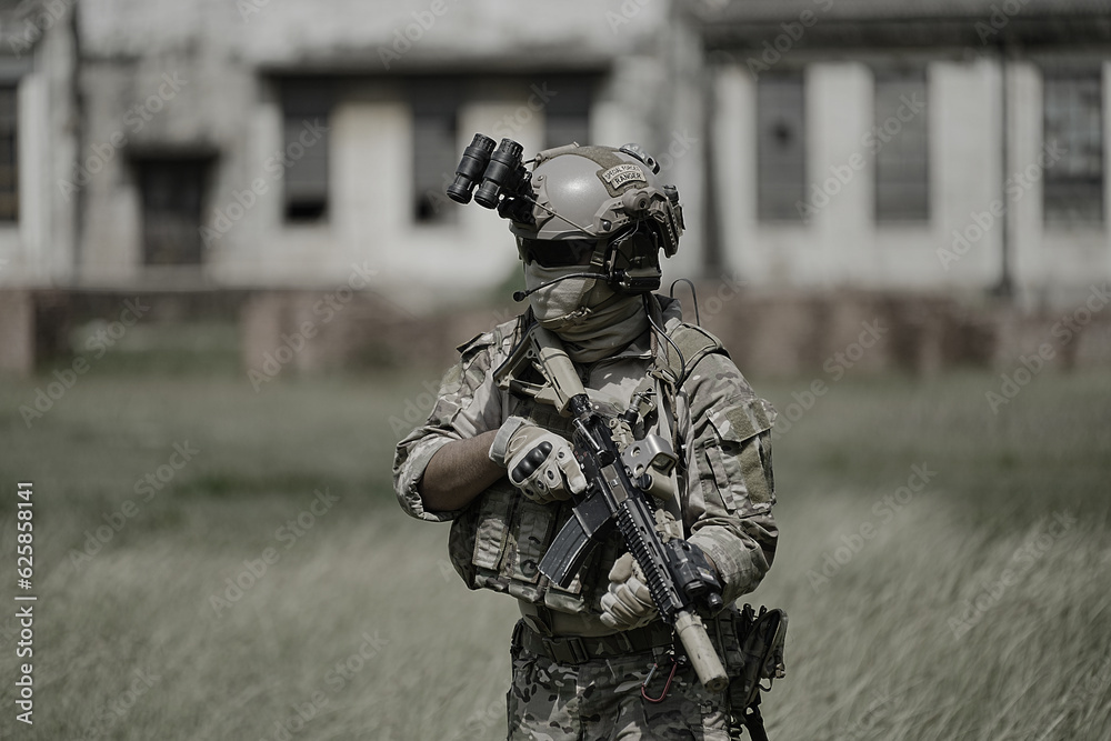 United States Army ranger during the military operation. Professional marine soldiers training with weapon on a military range. United States Army ranger during the military operation. Professional marine soldiers training with weapon on a military range.