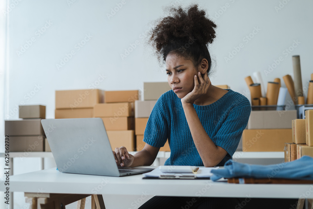 small online business owner Stressed woman having headache with lost parcel box at home.