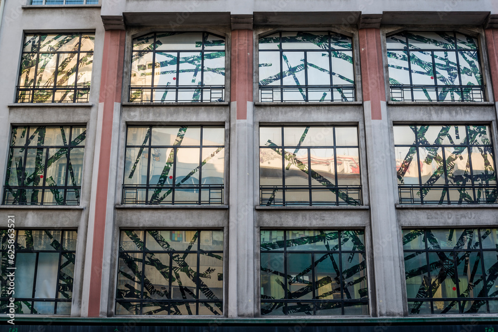 Obraz premium Windows of a building with abstract markings, Paris, France