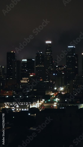 Wallpaper Mural Downtown Los Angeles California vertical. City of Los Angeles at night. Aerial shot of downtown skyline. Vertical mobile oriented. vertical video background	 Torontodigital.ca