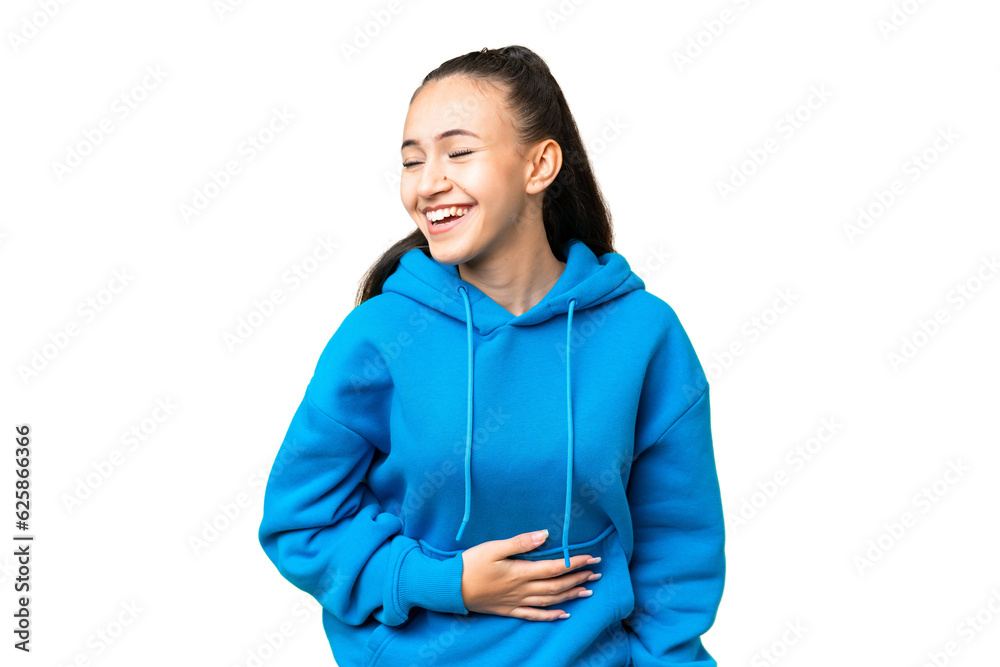 Young Arabian woman over isolated chroma key background smiling a lot Young Arabian woman over isolated chroma key background smiling a lot