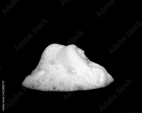 liquid white foam from soap or shampoo or shower gel Abstract soap bubbles. Set foam, soap bubble isolated on black, with clipping path texture and background. 