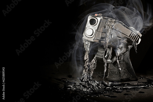 Smoking pistol melting photo