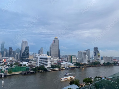 View from ICONSIAM shopping mall Saw many famous high-rise buildings in the center of Bangkok on a rainy evening in Thailand.This is the original image from the iPhone 11.