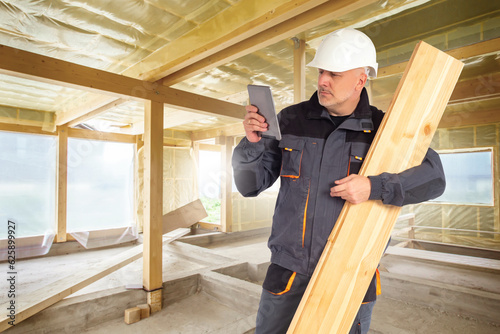 Man builder. Worker with wh...