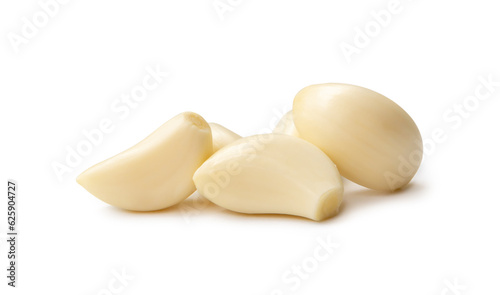 Peeled garlic cloves in stack isolated on white background with clipping path and shadow in png file format