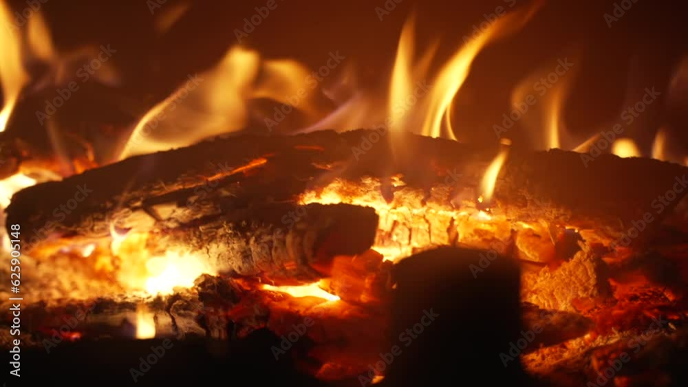 Burning firewood in the fireplace. Slow motion Burning firewood in the fireplace. Slow motion