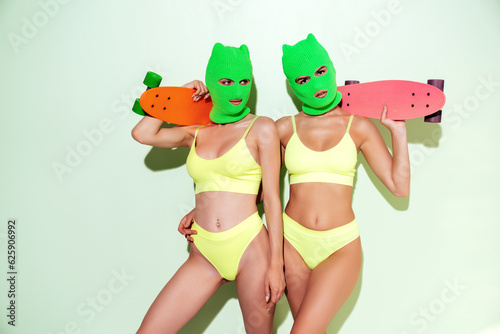 Two beautiful sexy women in green underwear Fototapet