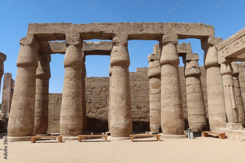 The great stone columns and statues in Luxor temple in the East bank in  Egypt