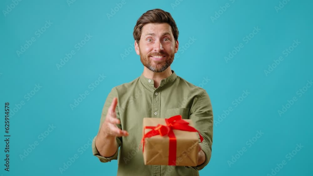 Man holds gift box behind back and offers to take present