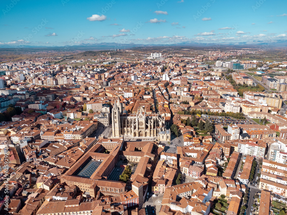 Aerial drone point of view of old town center of Leon. In the middle is the spectacular Cathedral of Leon. Historic city and important travel destination in Spain. Panoramic view of city center.