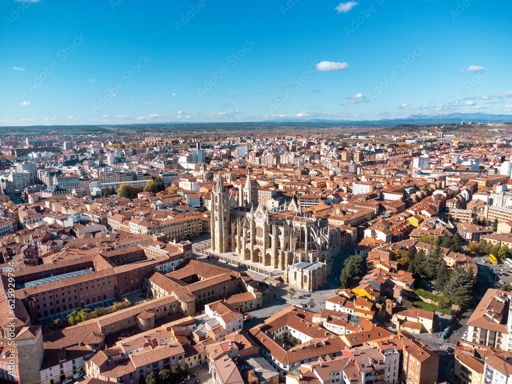 Aerial drone point of view of old town center of Leon. In the middle is the spectacular Cathedral of Leon. Historic city and important travel destination in Spain. Panoramic view of city center.